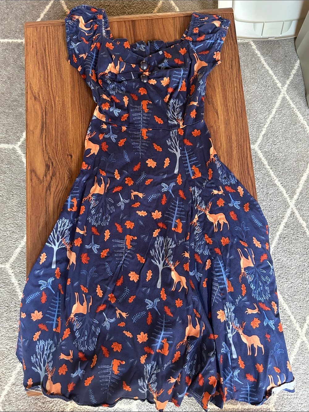 Collectif size sm uk10 woodland dress. Used great condition. Dog friendly home.